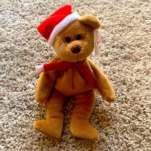 Teddy Ty Beanie Baby with tag protector. Excellent condition.